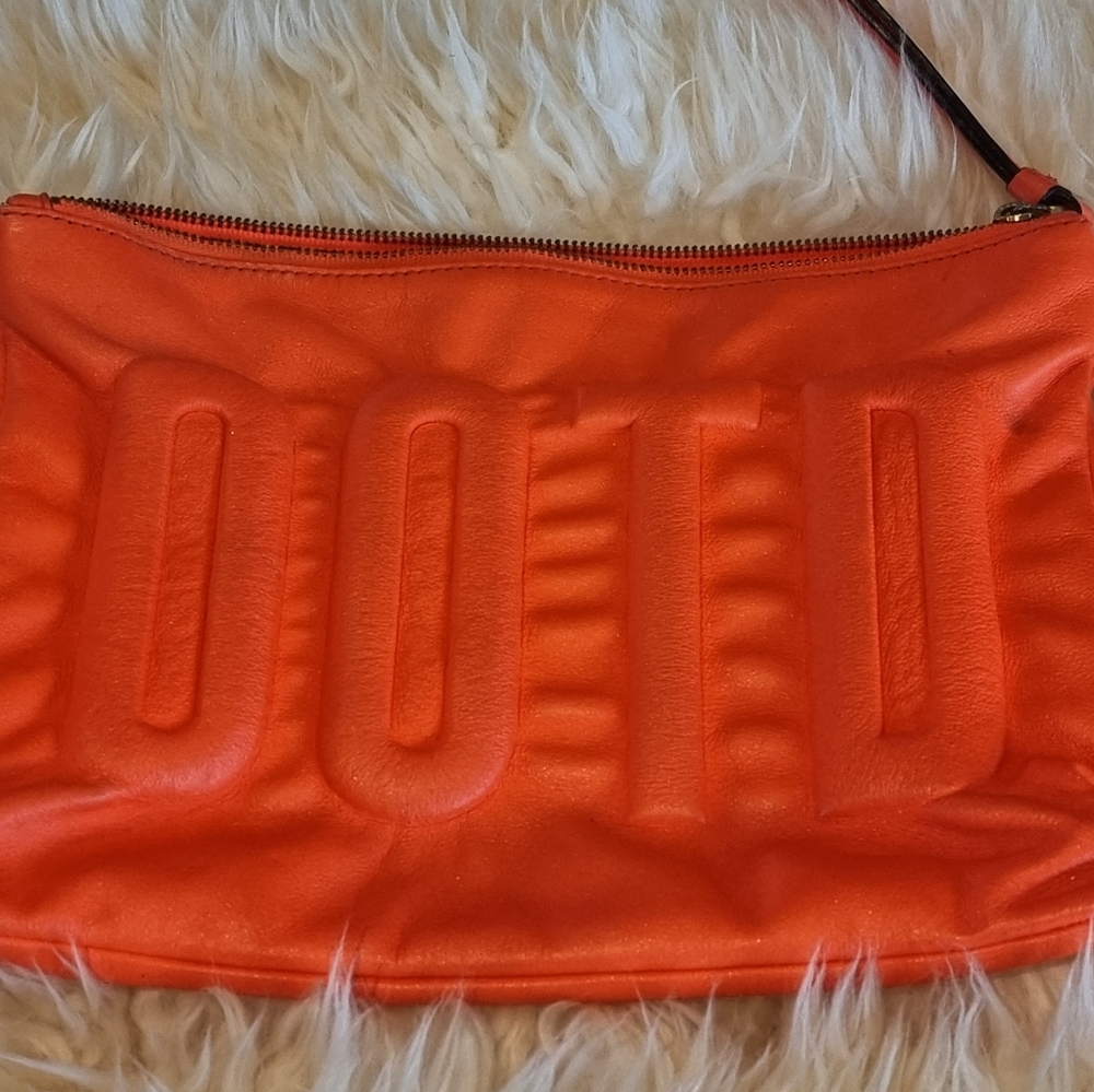 Kate Spade Neon Orange Wristlet